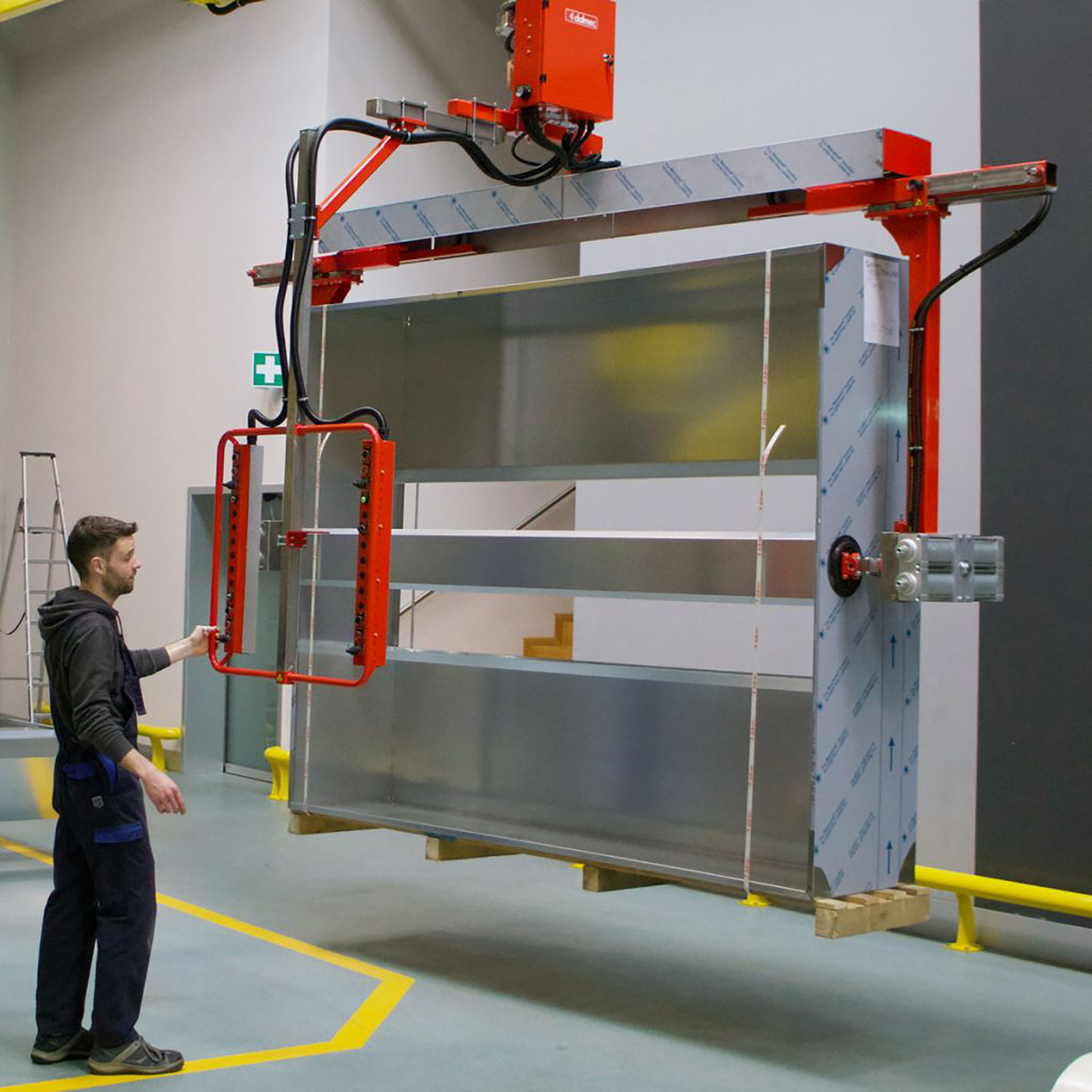 Manipulateur pour les structures pour hottes en métal